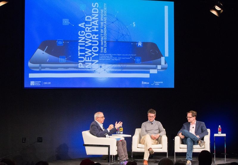 Influential tech writer Steven Levy discusses the impact of the iPhone on the economy and business with Benedict Evans, partner at Andreessen Horowitz, and Bertrand Schmitt, CEO and cofounder of App Annie, October 18, 2017. Produced by the Exponential Center at the Computer History Museum. Photo: © Computer History Museum/Douglas Fairbairn Photography.
