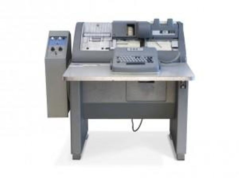 Preparing programs and data for early computers often required punching it into cards with a device like this IBM 026 Key Punch.